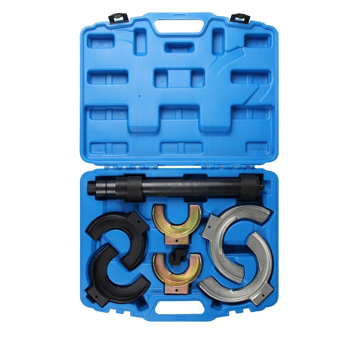 Heavy-duty MacPherson strut coil spring compressor set with interchangeable jaws and yoke extension bracket for conical springs, stored in blow-moulded case.